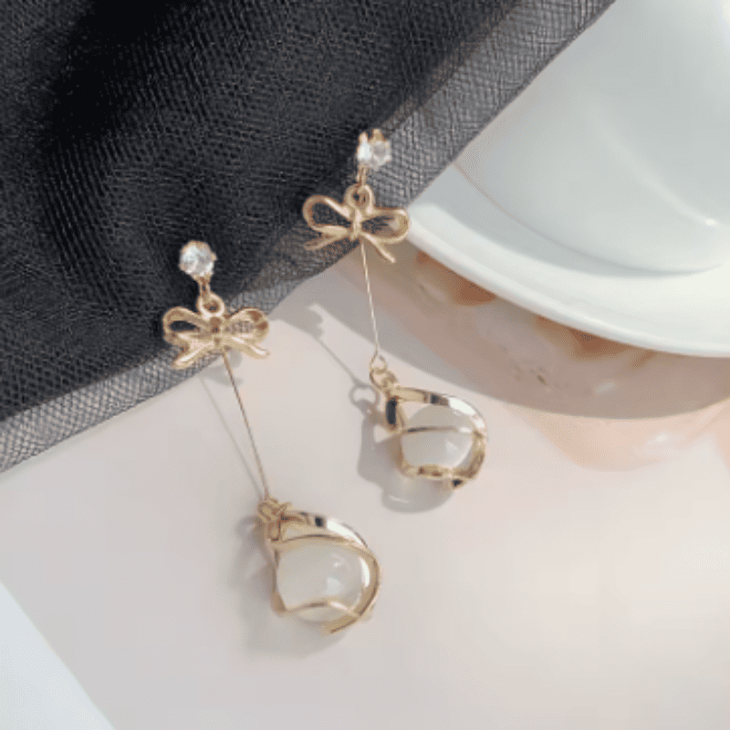 Golden Ribbon Glow Drop Earrings