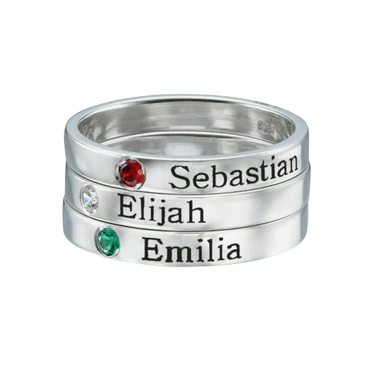 Stackable rings three ontop of each other in silver color with names